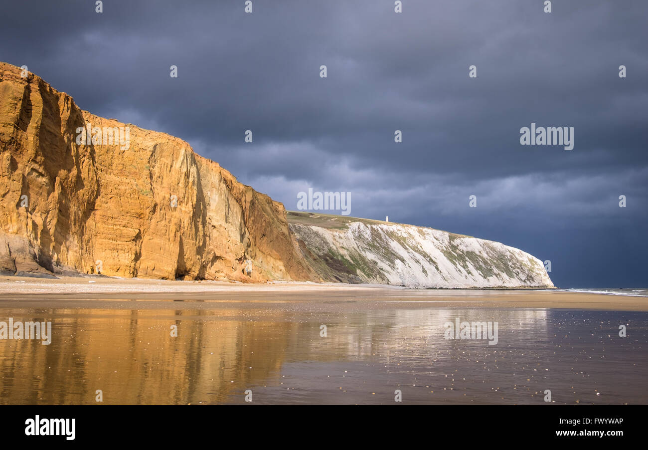 Dark clouds over Red Cliff and Culver Cliff at Yaverland in Sandown Bay on the Isle of Wight Stock Photo