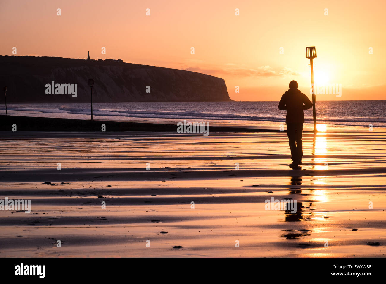 Man walking on the beach hi-res stock photography and images - Alamy