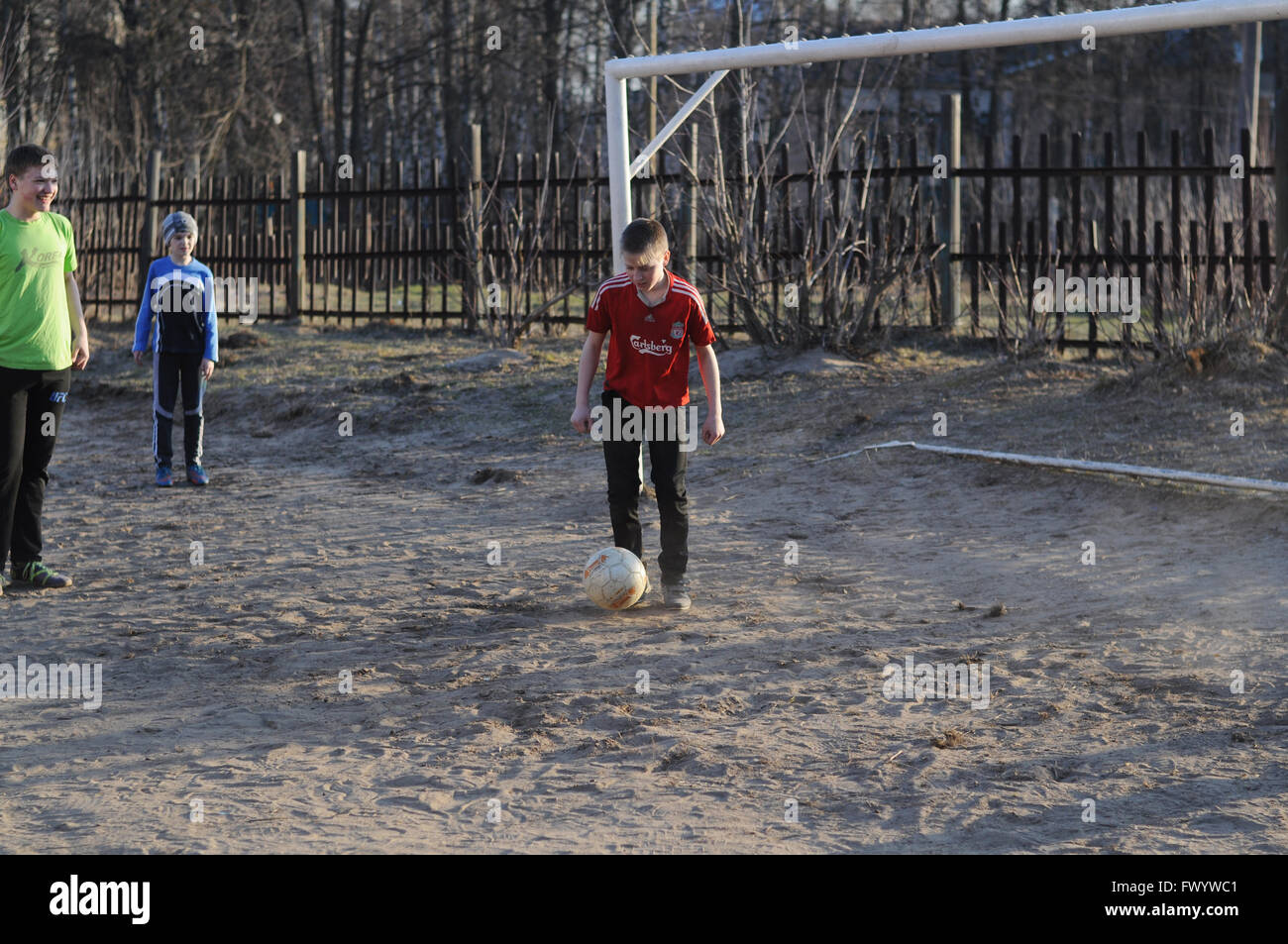 Teenagers playing soccer in the schoolyard, Kovrov, Russia Stock Photo