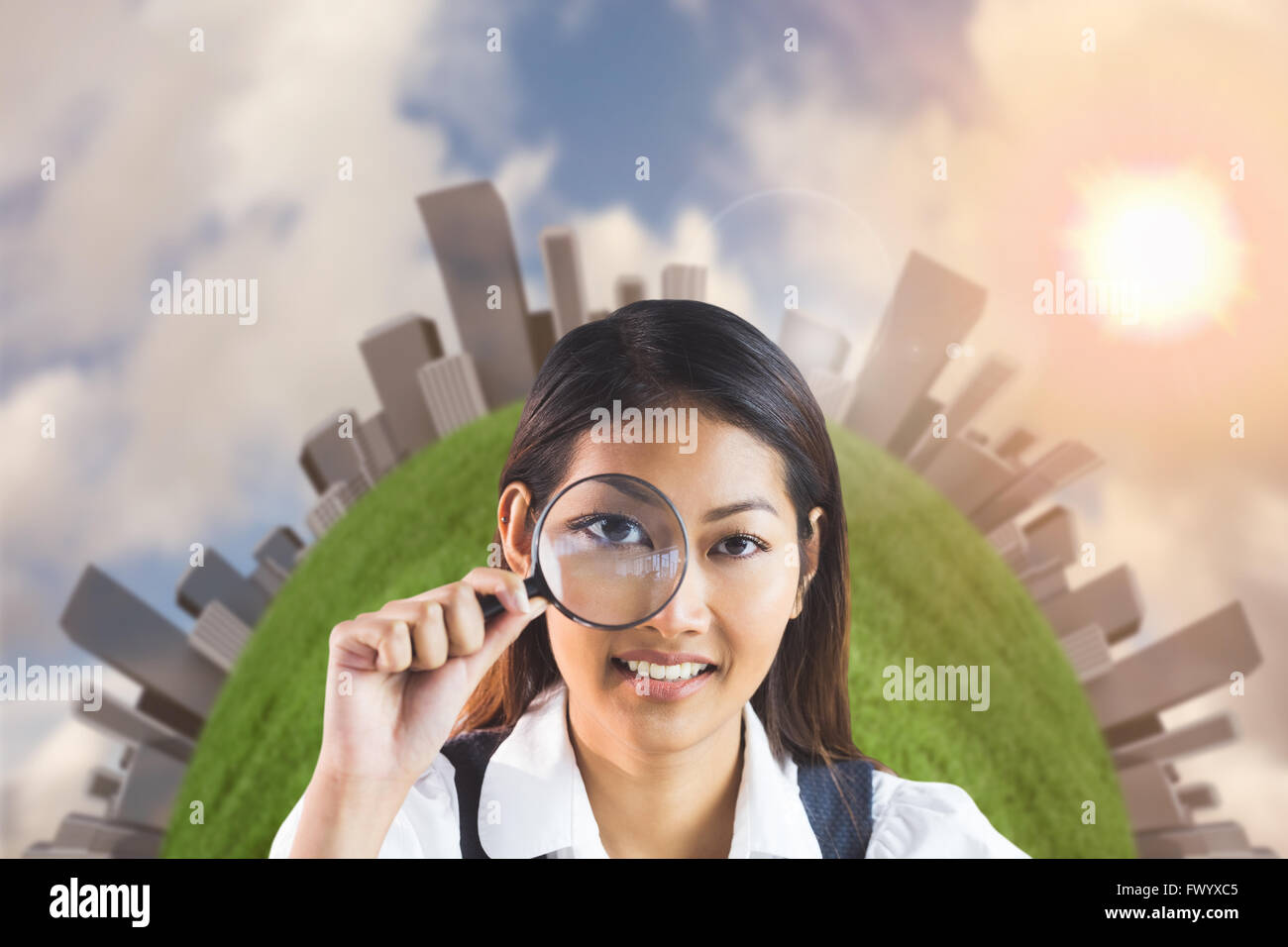 Businesswoman looking through magnifying glass Stock Photo - Alamy