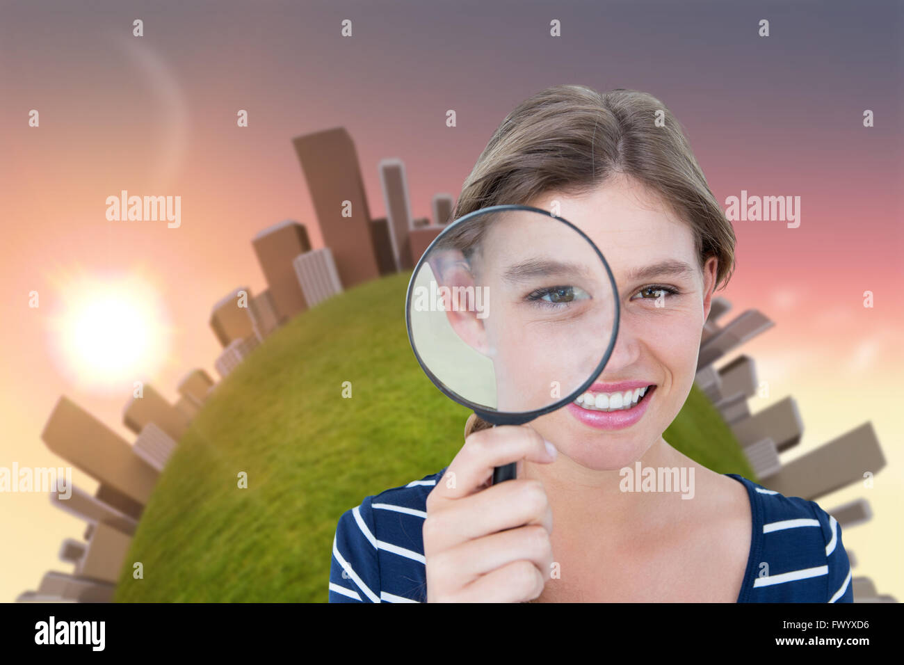 Smiling woman holding magnifying glass Stock Photo - Alamy