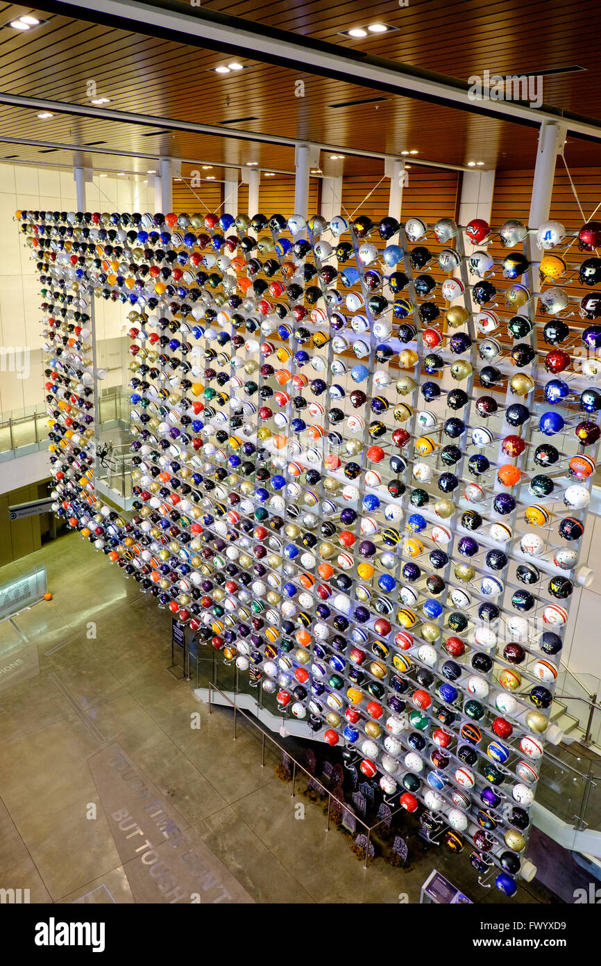 The helmet wall at the College Football Hall of Fame, Atlanta, Georgia, USA Stock Photo