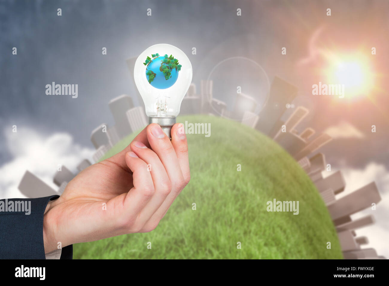 Hand holding environmental light bulb Stock Photo Alamy