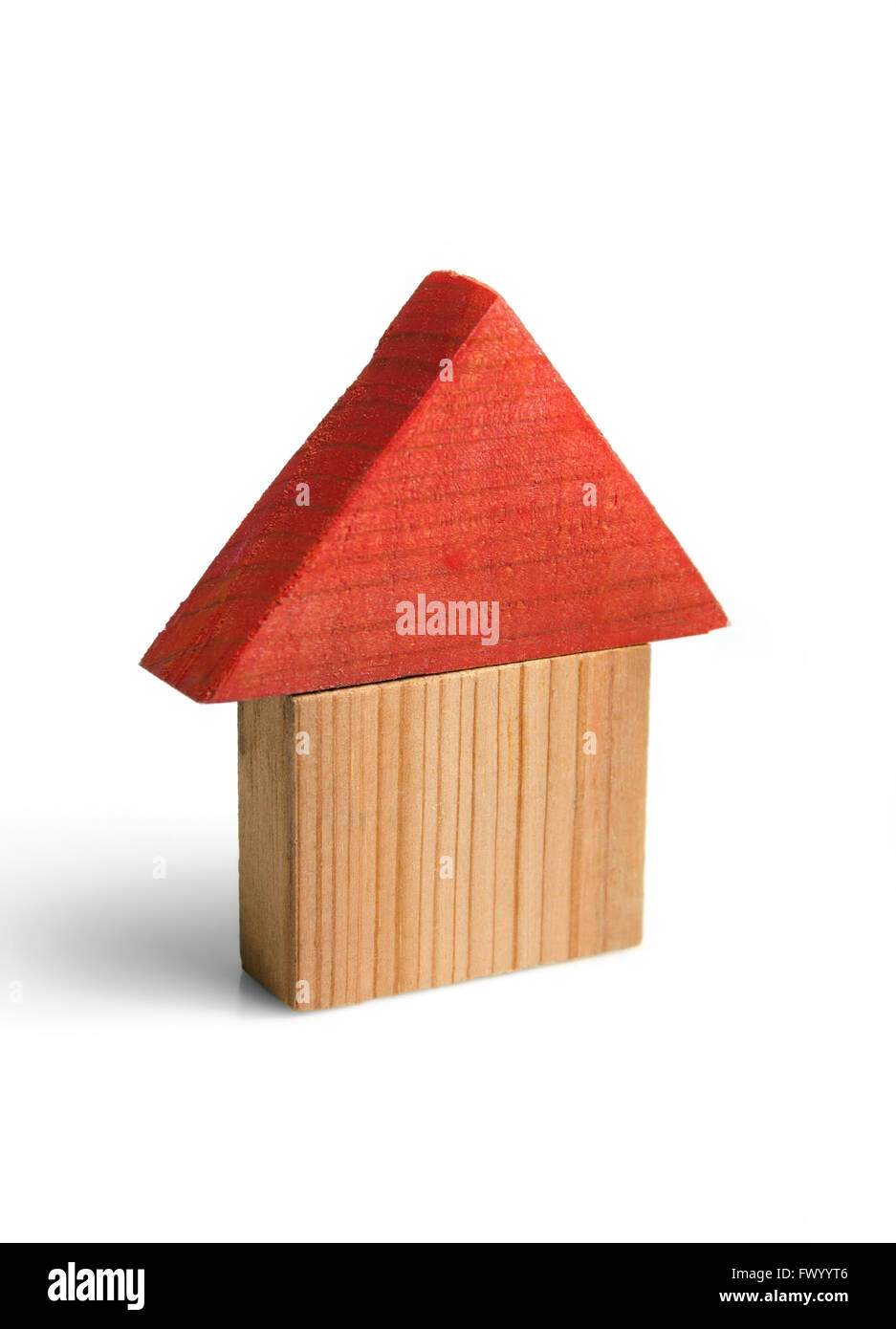 Wooden house model, symbol of real estate business. Stock Photo