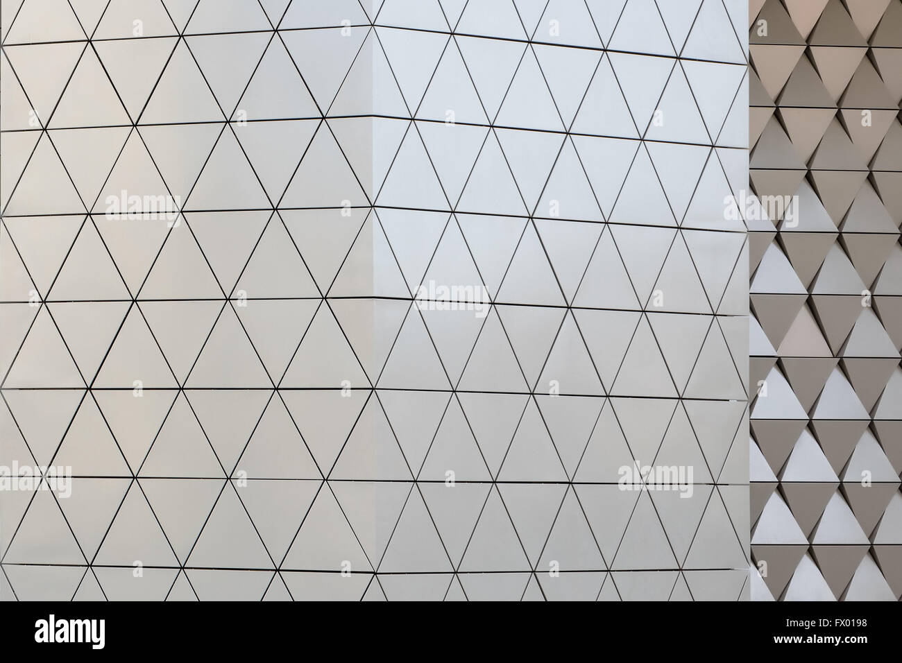 Abstract close-up view of modern aluminum ventilated facade of triangles Stock Photo