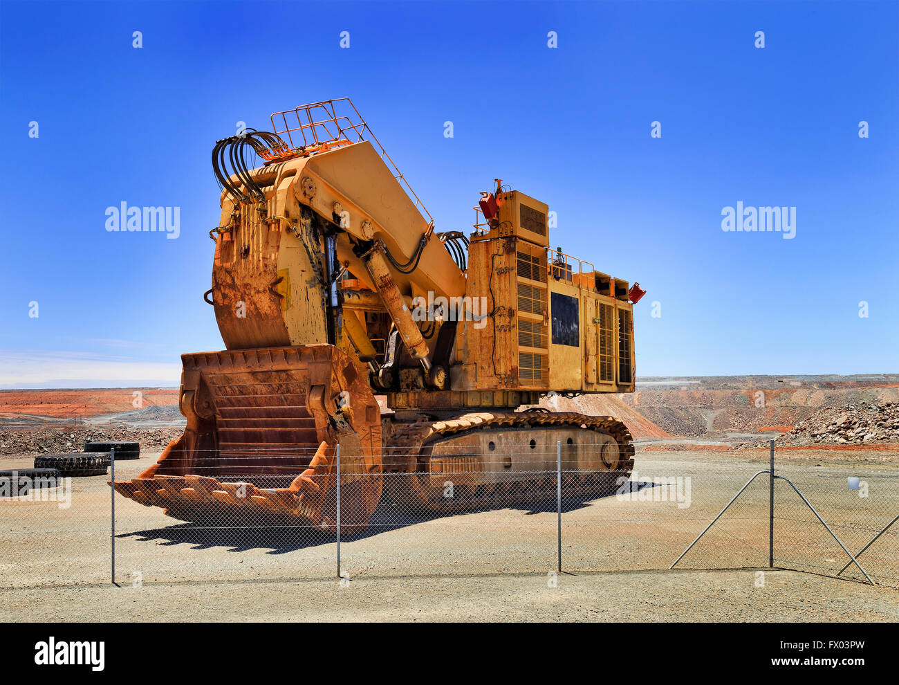 Demonstration obsolete model of heavy gold ore loader and excavator at Kalgoorlie open pit mine in Western Australia. Stock Photo