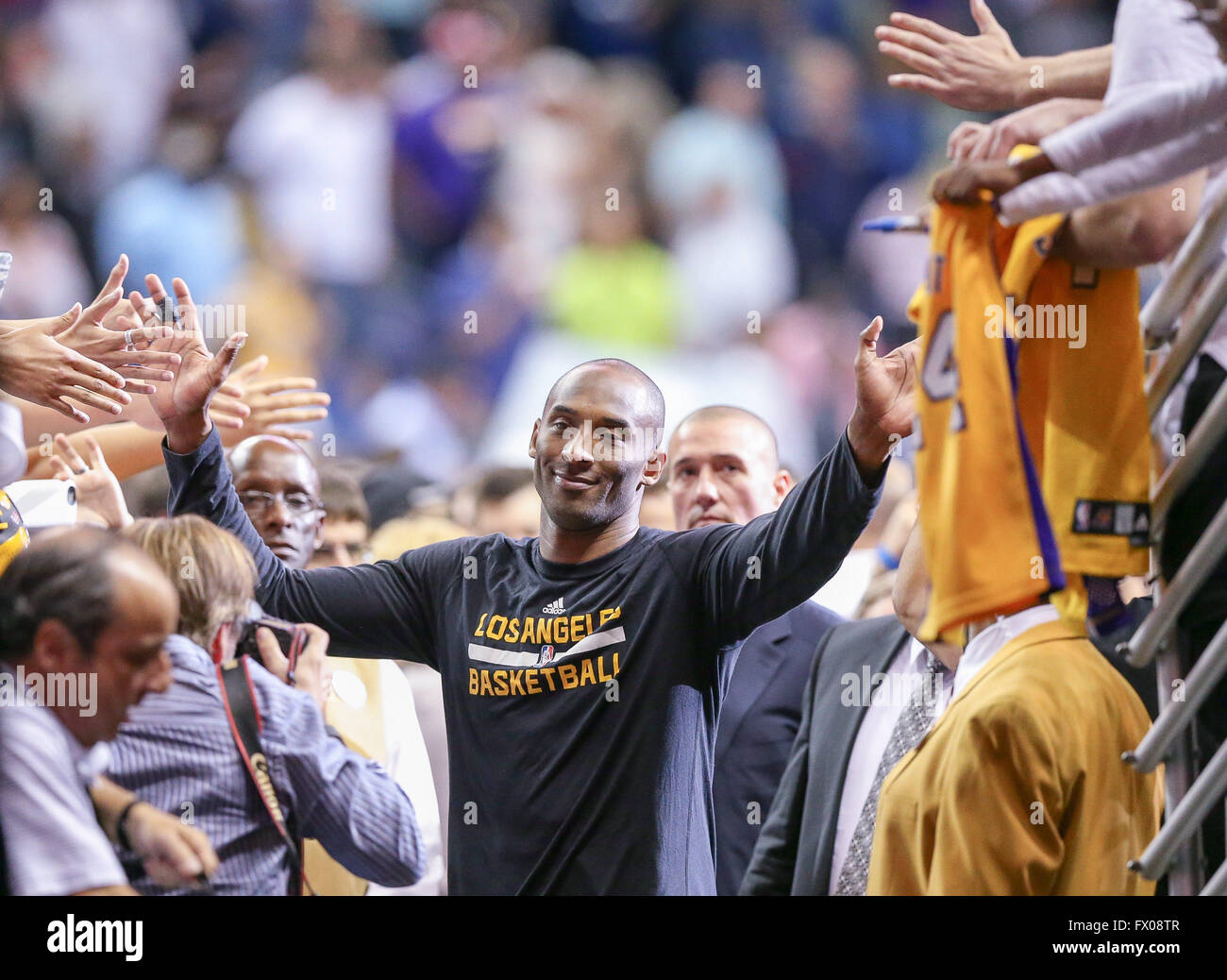New Orleans, LA, USA. 08th Apr, 2016. Los Angeles Lakers forward Kobe Bryant (24) celebrating a great career with fans as he heads into the tunnel after an NBA basketball game between the Los Angeles Lakers and the New Orleans Pelicans at the Smoothie King Center in New Orleans, LA. Stephen Lew/CSM/Alamy Live News Stock Photo