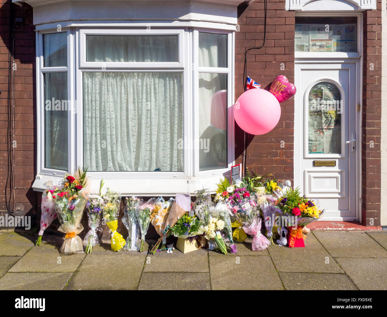 Redcar Cleveland UK April 9th 2016 continued strong local feeling about the case of the abused Bulldog called “Baby” has led to floral tributes being placed outside its former home.      Andrew Frankish, 22, and his brother Daniel, 19, from Redcar, were given 21-week jail sentences suspended for two years after abusing and seriously injuring a bulldog named Baby, which was later put down.  World-wide interest in the case has produced several petitions to demand stiffer sentences for animal cruelty. Credit:  Peter Jordan NE/Alamy Live News Stock Photo