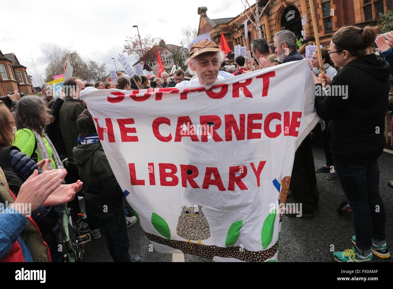Lambeth, London, UK. 09th Apr, 2016. Defend the ten protest march against proposed changes to Lambeth library services including Carnegie library in Herne Hill. Carnegie library was occupied for 10 days since Lambeth closed the library to convert the building to a 'heatlhy living centre' with gym. The occupation ended today and over 1000 demonstraters marched from Carnegie library to Brixton's Tate library via Minet Library., services10 days since Lambeth closed the library to convert the building to a 'heatlhy living centre' with gym. Credit:  David Stock/Alamy Live News Stock Photo