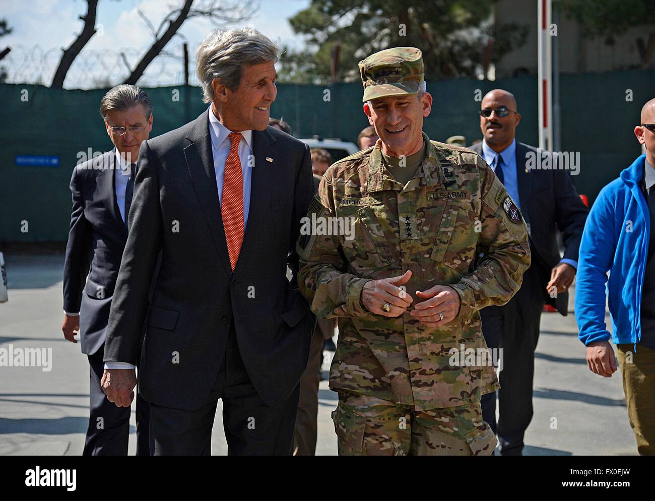 Kabul, Afghanistan. 9th April, 2016. U.S Secretary of State John Kerry walks with Gen. John Nicholson, Commander of the U.S. Forces in Afghanistan, at Camp Resolute Support April 9, 2016 in Kabul, Afghanistan. Kerry made a surprise visit to Kabul to meet with government leaders and U.S. Armed Forces commanders. Credit:  Planetpix/Alamy Live News Stock Photo