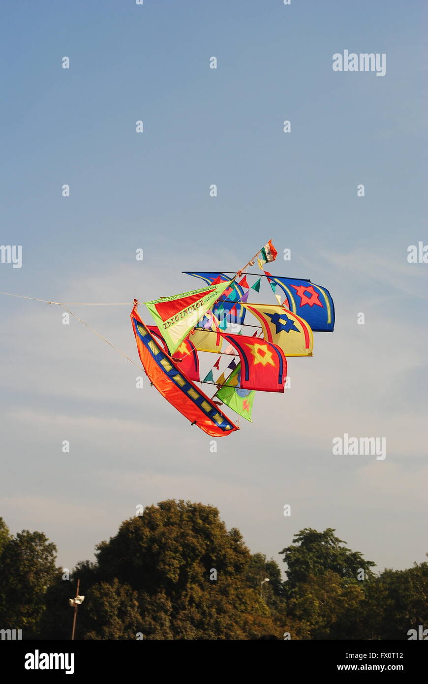 a bright and colourful ship shaped kite flying during the Kite Flying