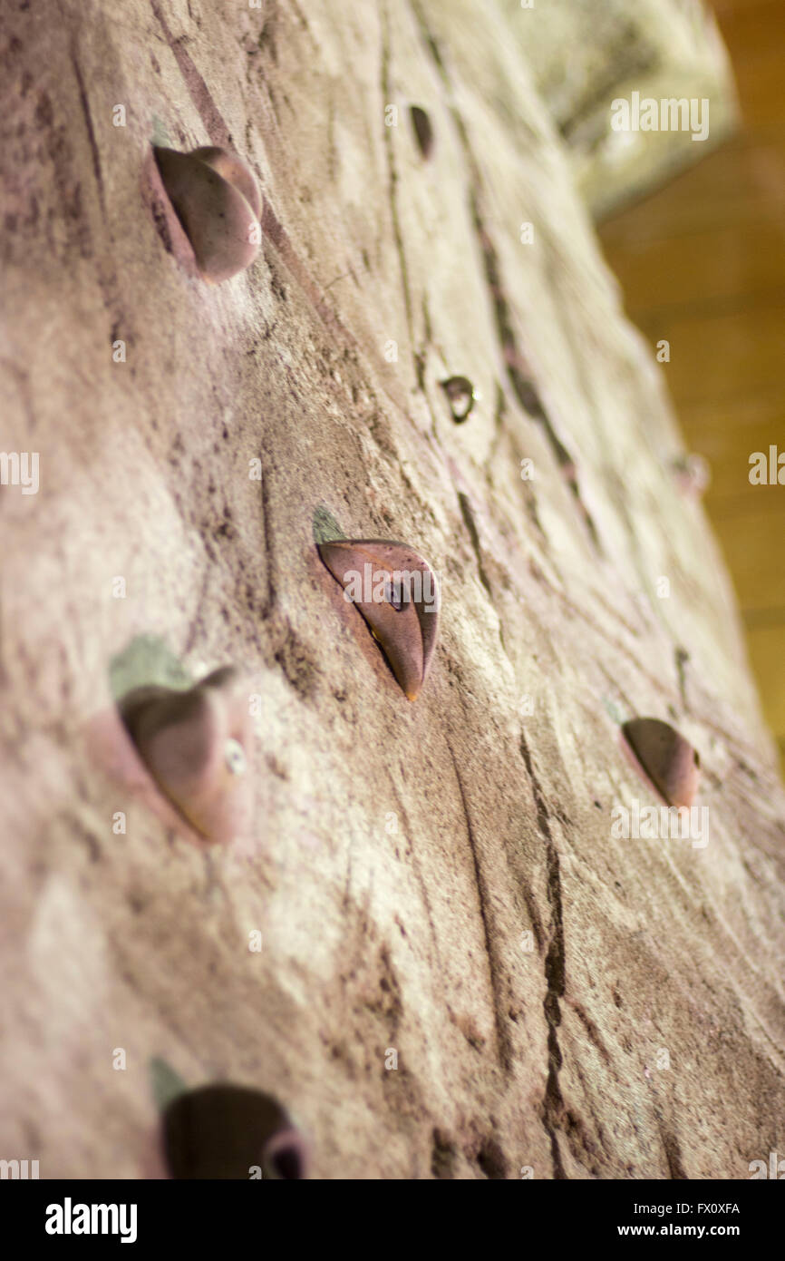 Indoor climbing wall training artificial rock with boulder hand and