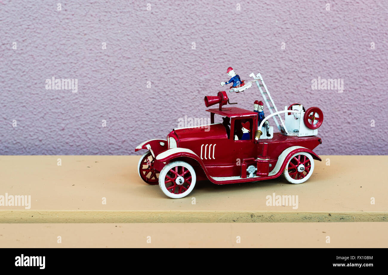 red toy fire engine with fireman Stock Photo