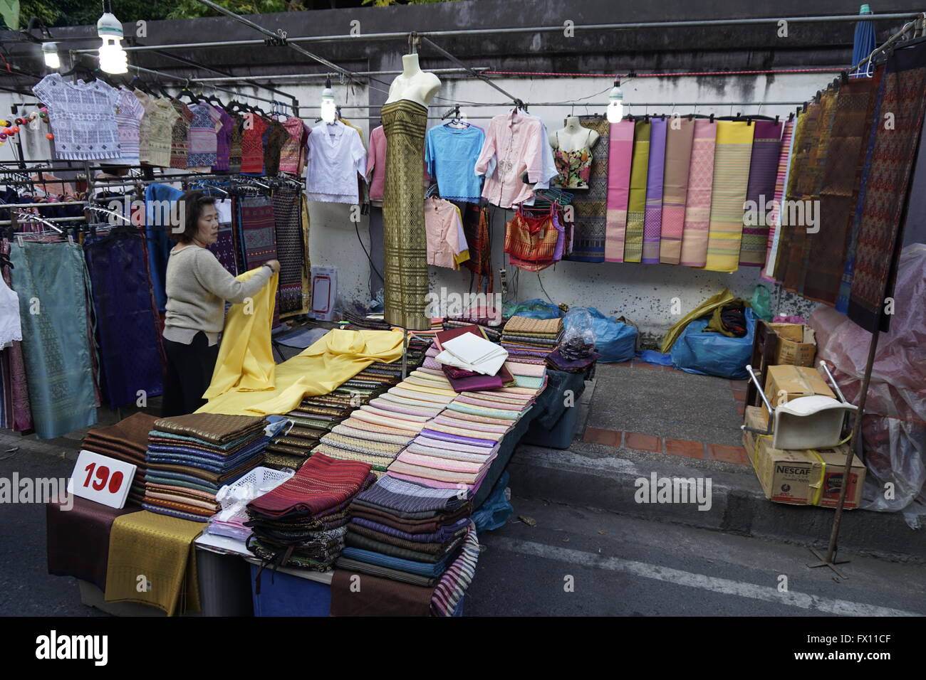 Man selling clothes street market hi-res stock photography and images -  Alamy