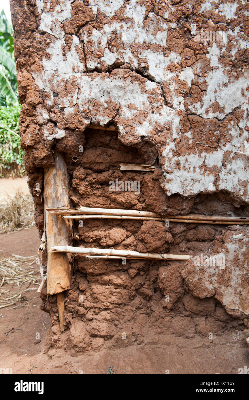 Building made from mud a wood, showing edge which has dropped away