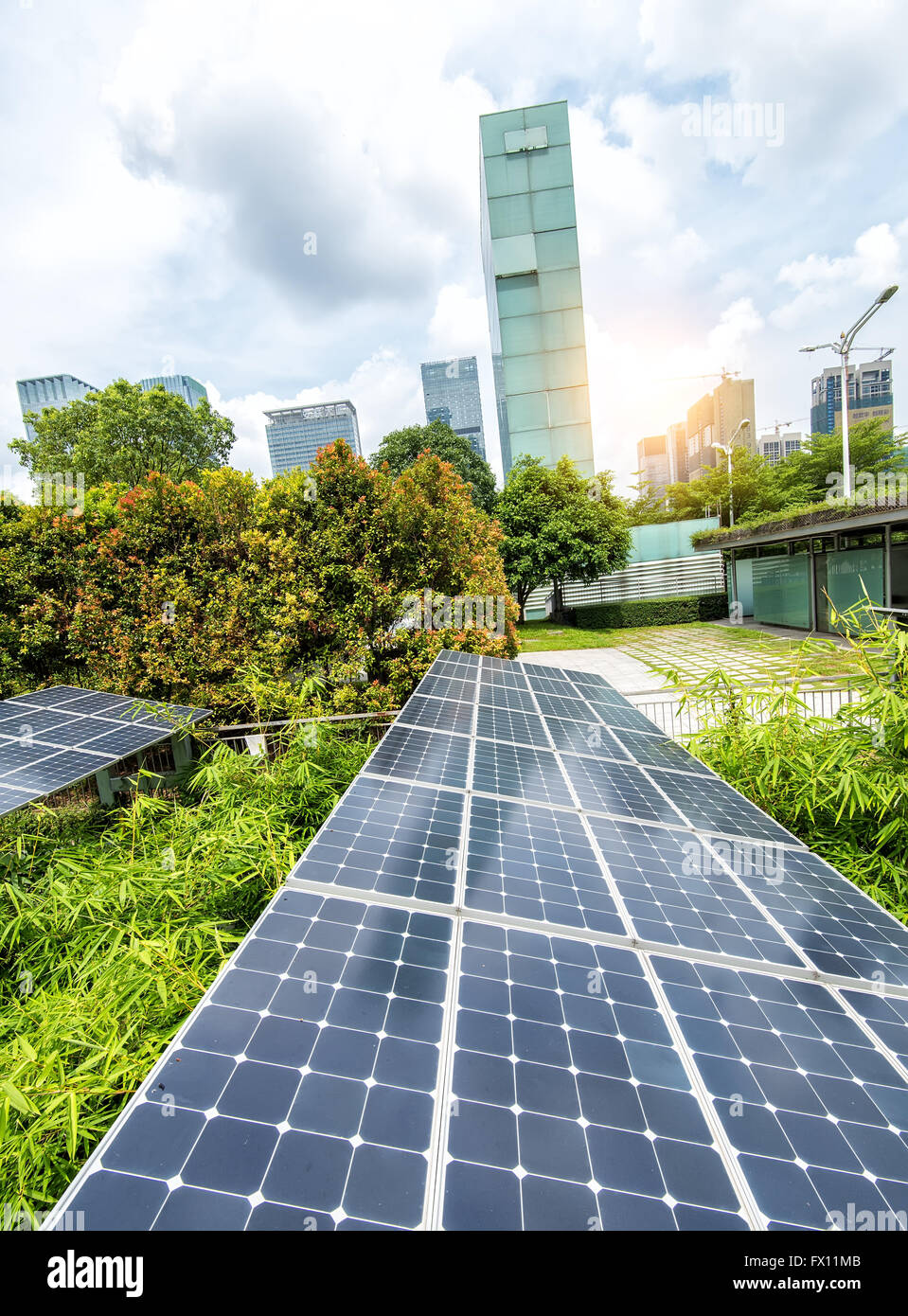 Solar Panels In The Park Of Modern City Stock Photo