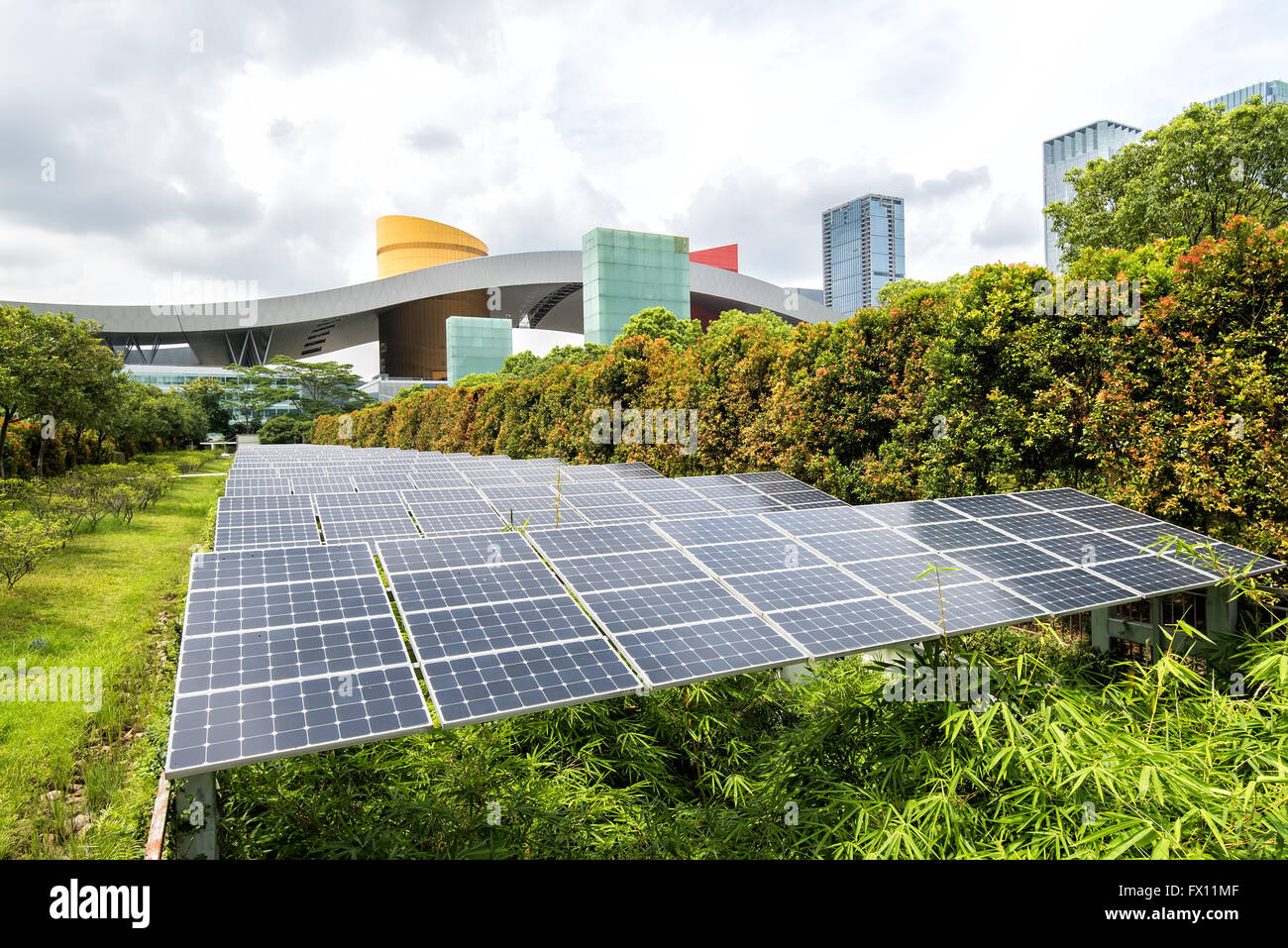 Solar Panels In The Park Of Modern City Stock Photo