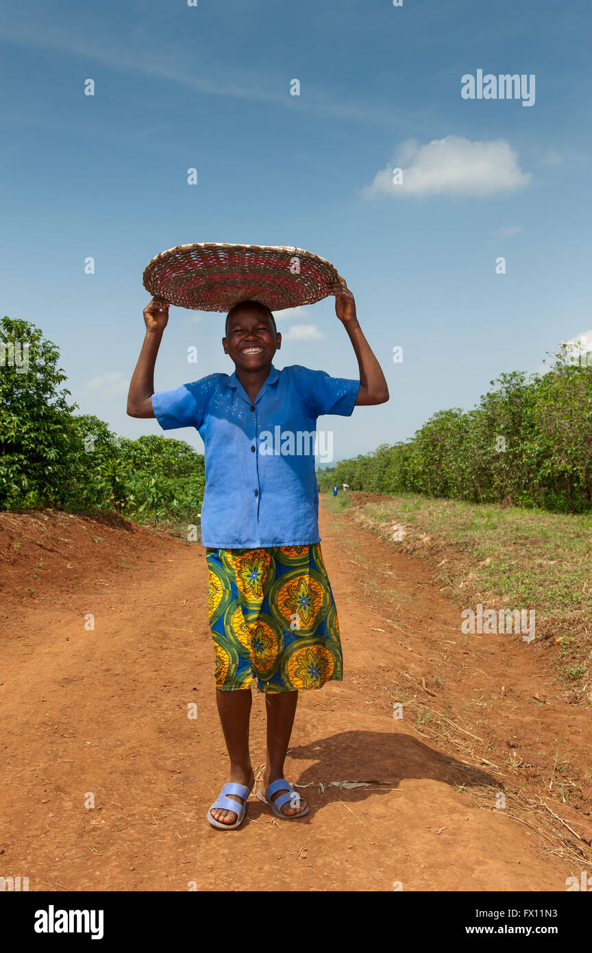 African Woman Carrying Basket On Head