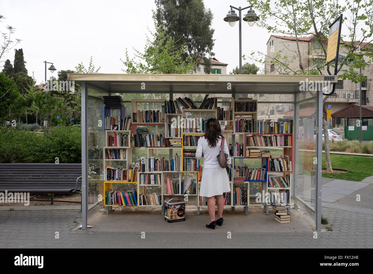 A woman browses inside a bus station which was transformed into a free
