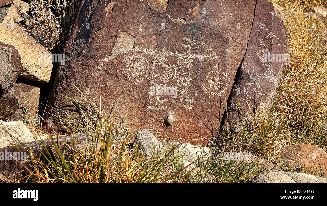 Ancient petroglyph carved into rock at Three Rivers Petroglyph Site in New Mexico Stock Photo
