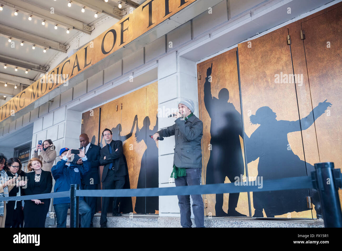 Lin-Manuel Miranda addresses theater lovers in front of the Richard Rodgers Theatre in Times Square in New York on Wednesday, April 6, 2016 prior to the #Ham4Ham lottery for seats for the Broadway blockbuster 'Hamilton'. The $10 live lottery takes place in front of the theater for the Wednesday matinee performance while for the rest of the week's performances the lottery is online. (© Richard B. Levine) Stock Photo