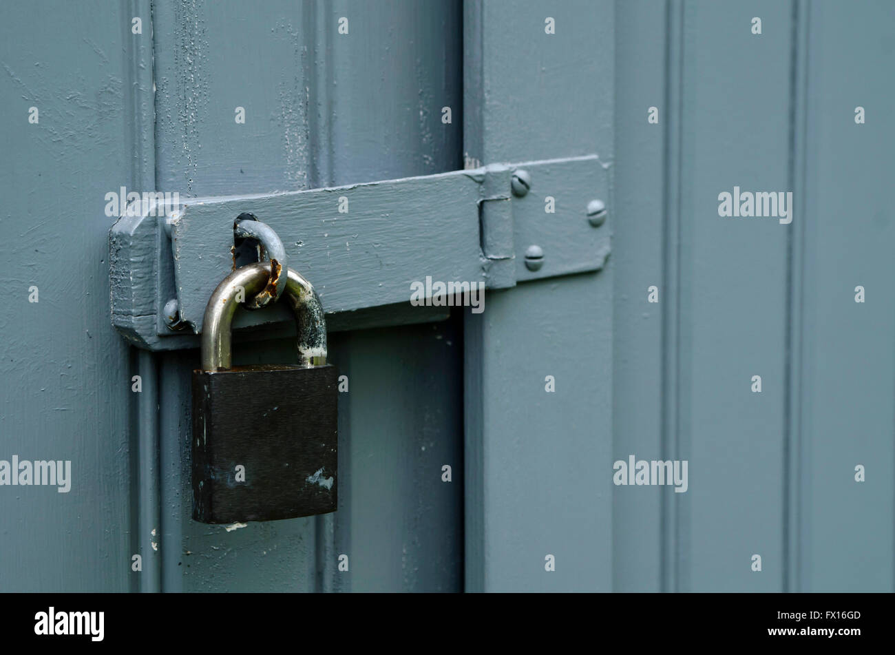 Padlock on wooden door Stock Photo Alamy