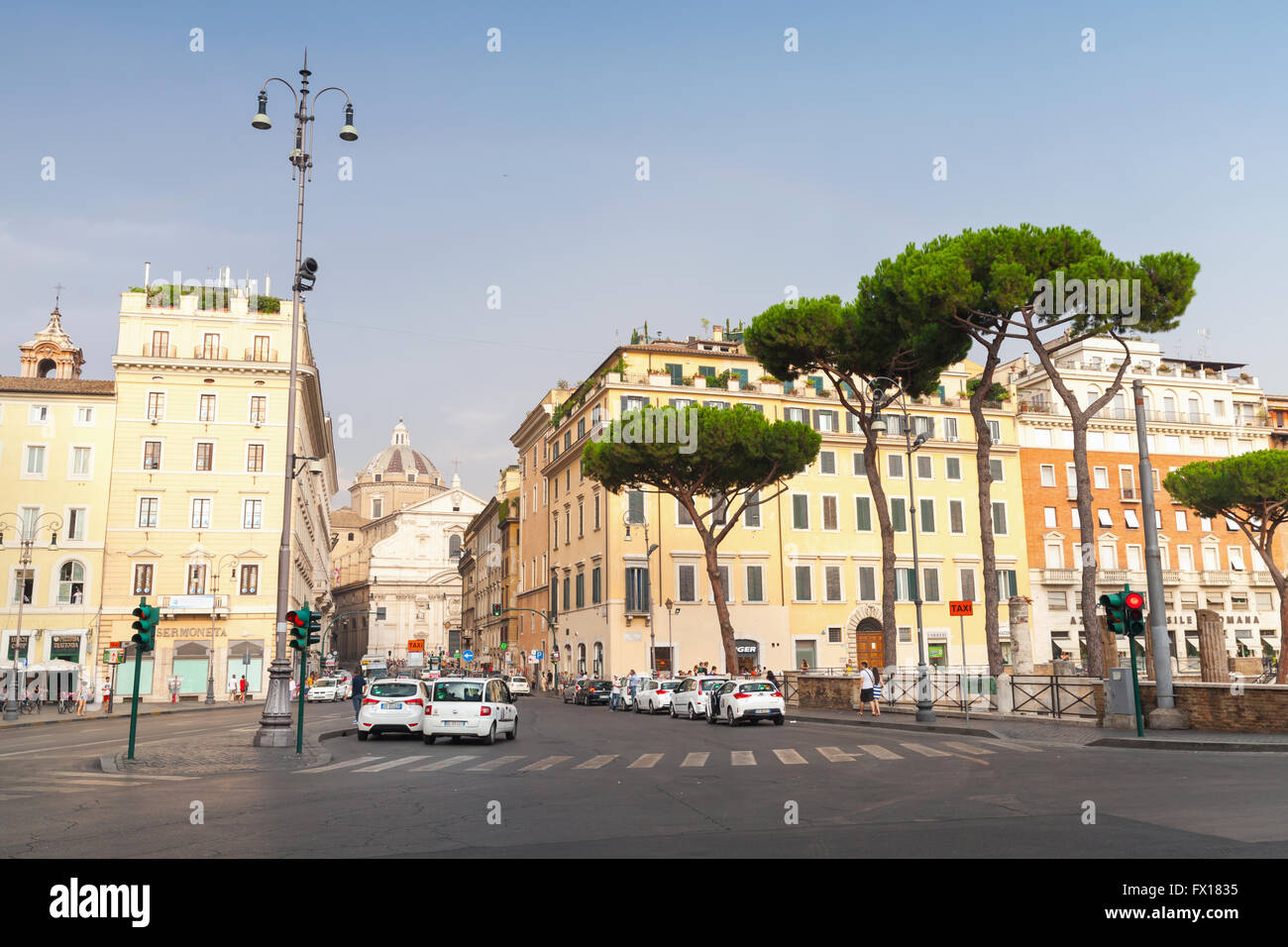 Rome, Italy - August 8, 2015: Largo di Torre Argentina, square in Rome. Street view with walking ordinary people and cars Stock Photo