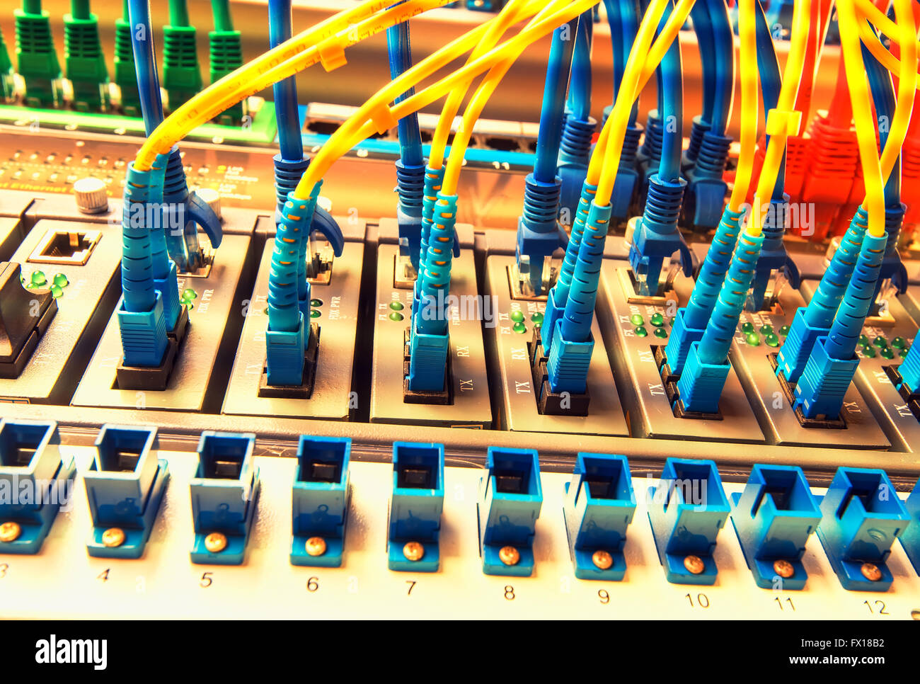 Fiber optic connecting on core network swtich Stock Photo - Alamy