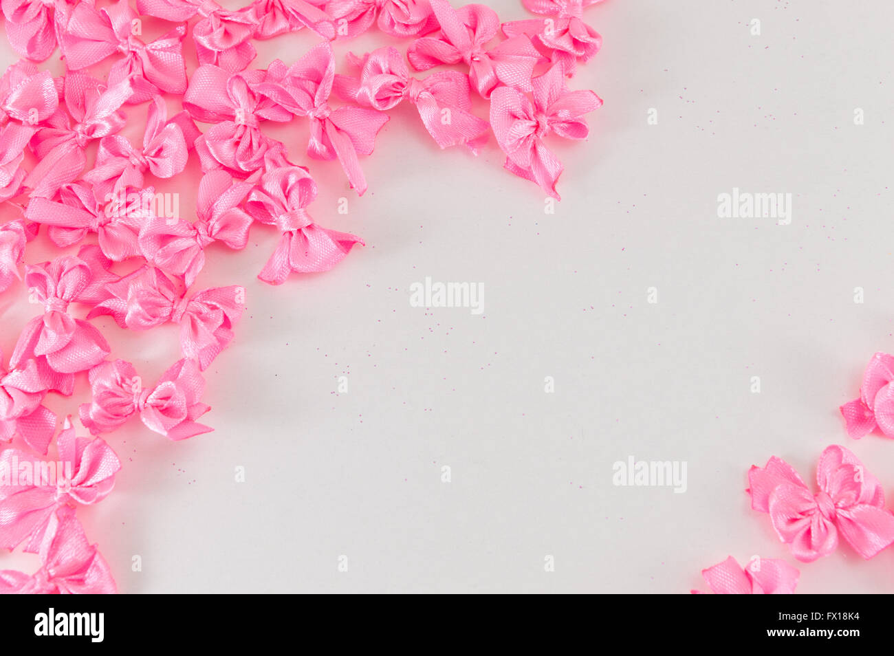 pink ribbons with copy space on white Stock Photo