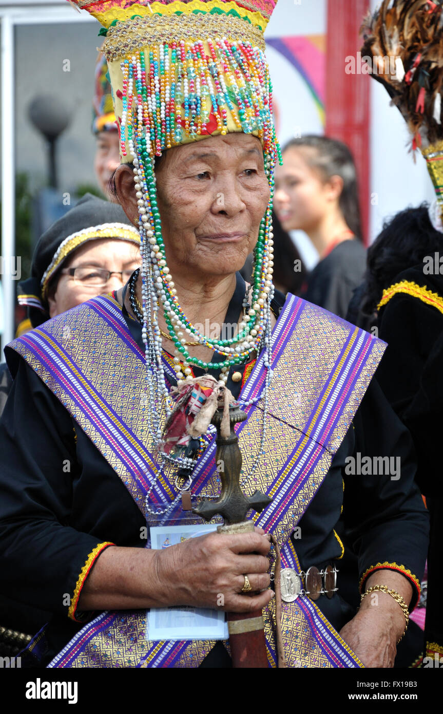 Bobohizan or high priestess in Kadazandusun pagan rites during the State Harvest Festival Celebration in Kota Kinabalu, Sabah. Stock Photo