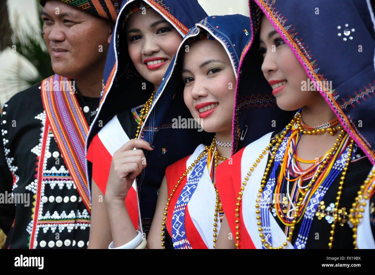 Kadazan dusun tribe in traditional costume during Sabah Harvest festival celebration in Kota Kinabalu, sabah Borneo, Malaysia. Stock Photo