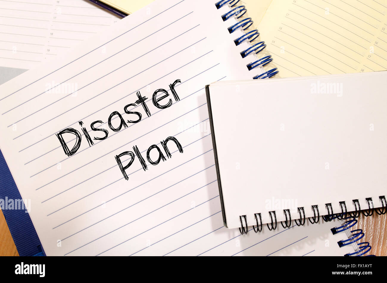 Disaster plan text concept write on notebook Stock Photo - Alamy