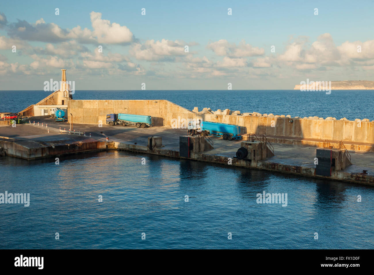 Cirkewwa Ferry Terminal, Malta. Gozo in the distance. Stock Photo