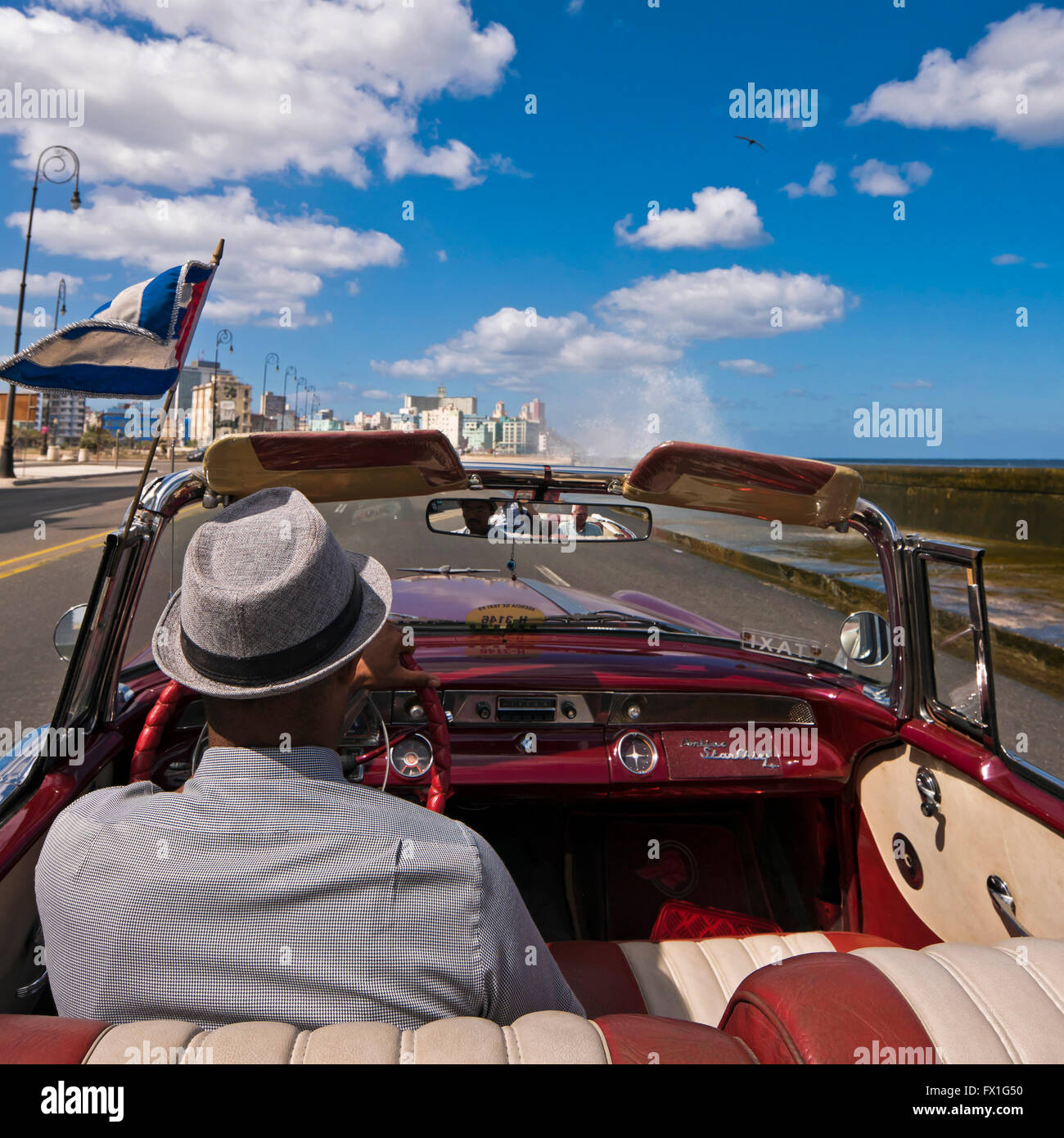Horizontal view of the Malecon from inside a classic American car in Havana, Cuba. Stock Photo