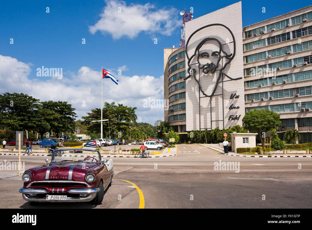 Horizontal view of a classic American car parked in Revolution Square in Havana, Cuba. Stock Photo