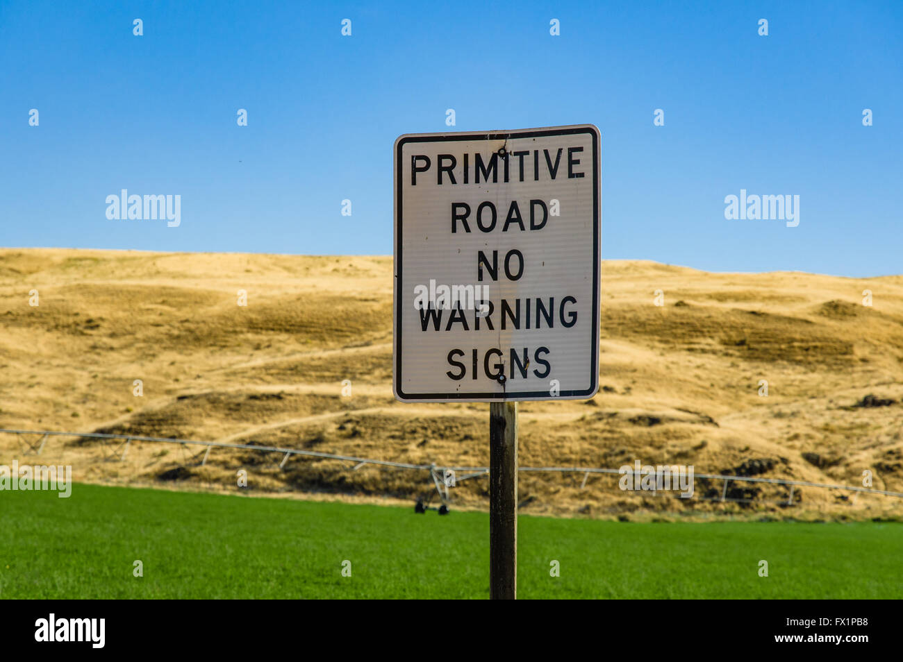 Road sign in rural eastern Washington warning of primitive road