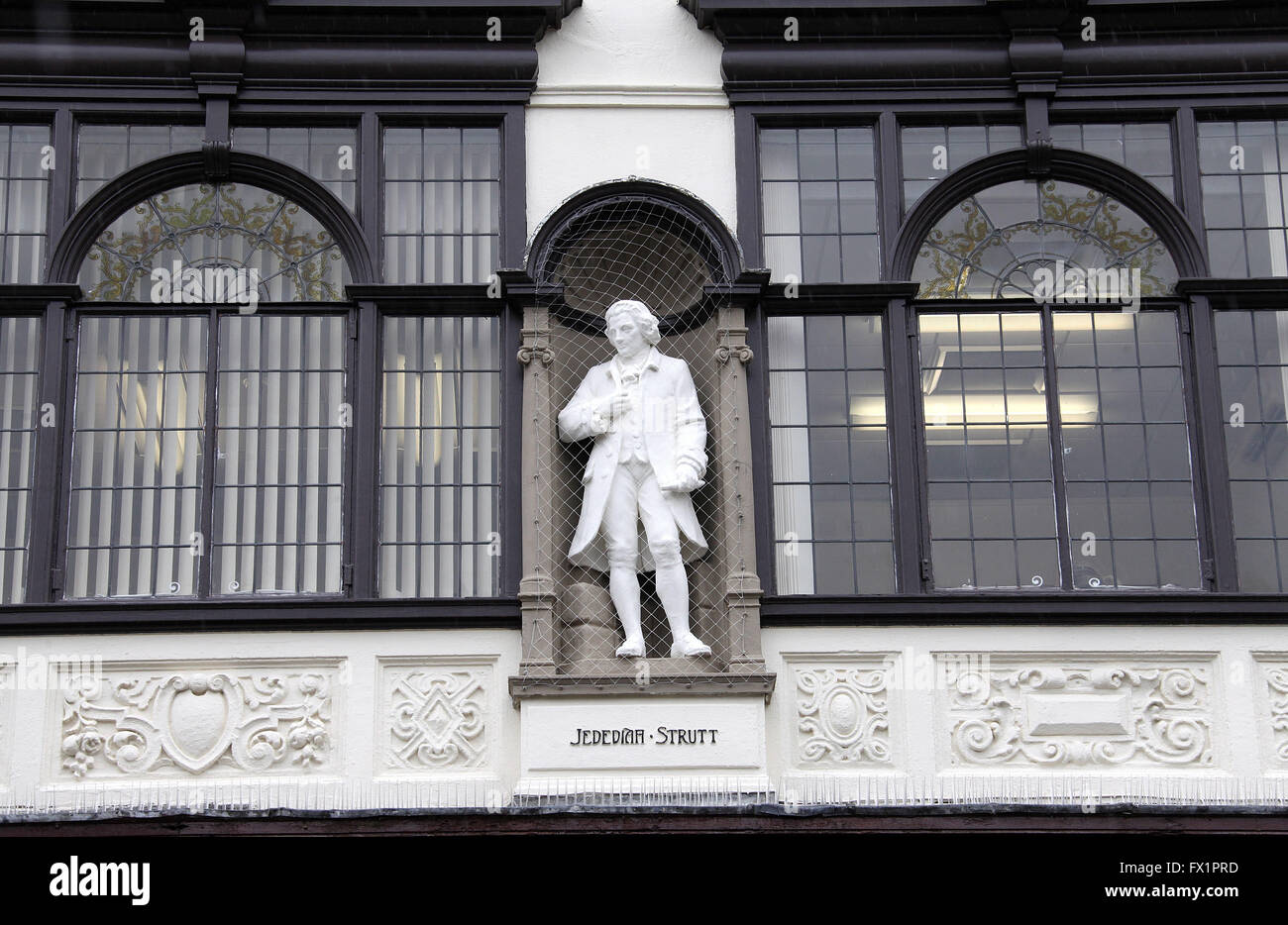 Statue on the former Boots the Chemist building in Derby which was built in 1912 in the Arts and Crafts Style Stock Photo