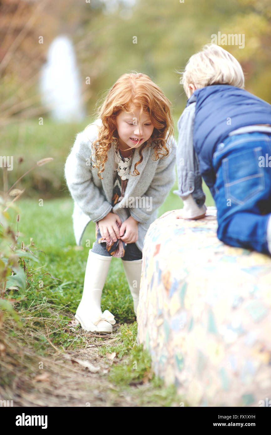 Family pictures of brother and sister at the park Stock Photo - Alamy