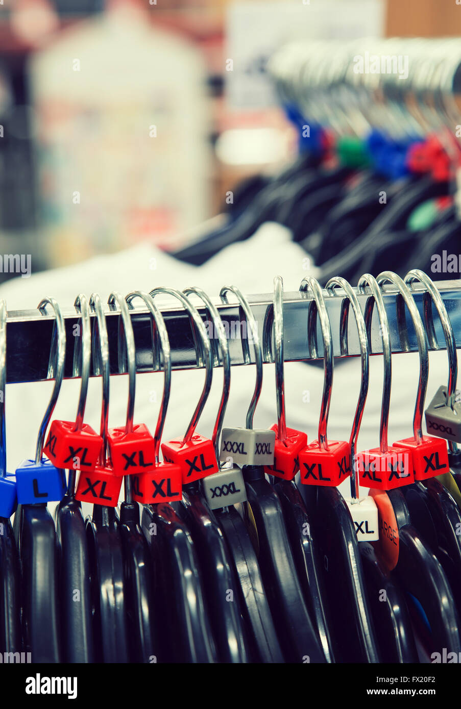 Sizes on clothes hangers Stock Photo Alamy