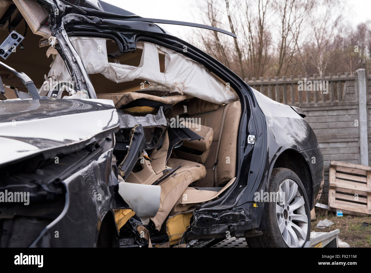 photo showing the heavily crashed car in a road accident Stock Photo ...