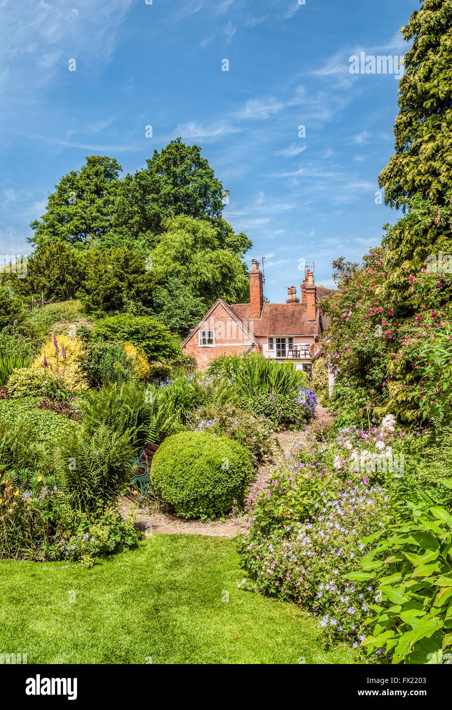 Mill Garden just below the Caesars Tower of Warwick Castle in Warwick a medieval county town of Warwickshire, England.| Mill Gar Stock Photo