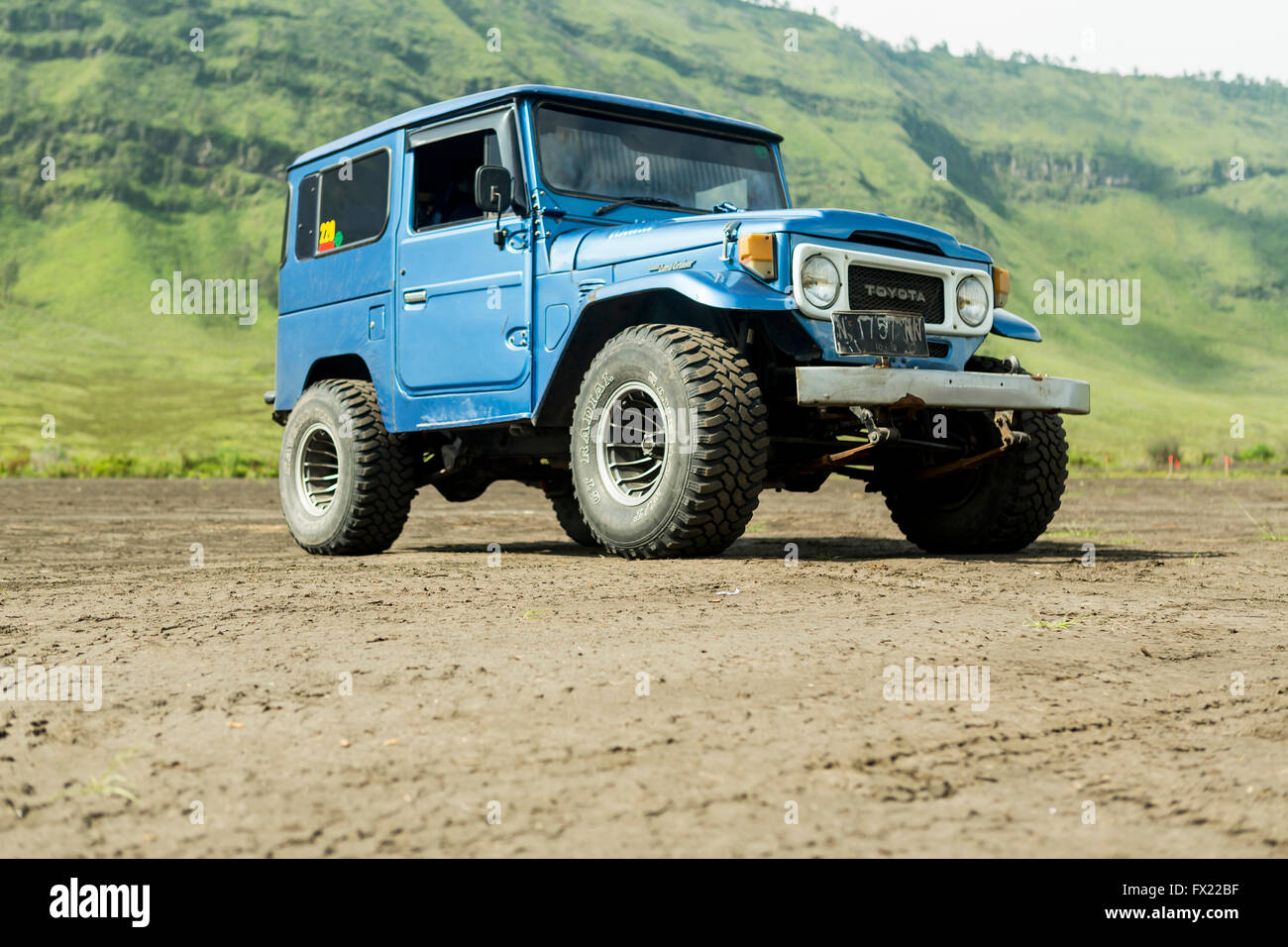 Java, Indonesia- March, 24, 2016 : Blue 4x4 Jeep for tourist at caldera ...