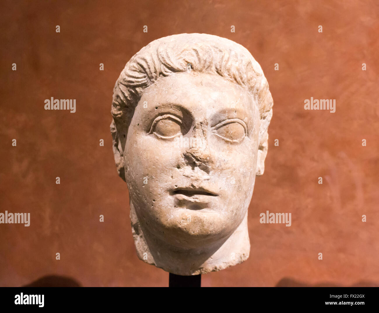 Roman sculpture head in Sully Wing of Musee du Louvre, Paris, France