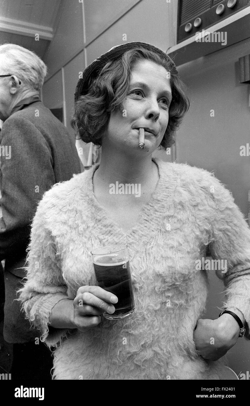 Woman smoking cigar Britain 1960s 1967 Stock Photo