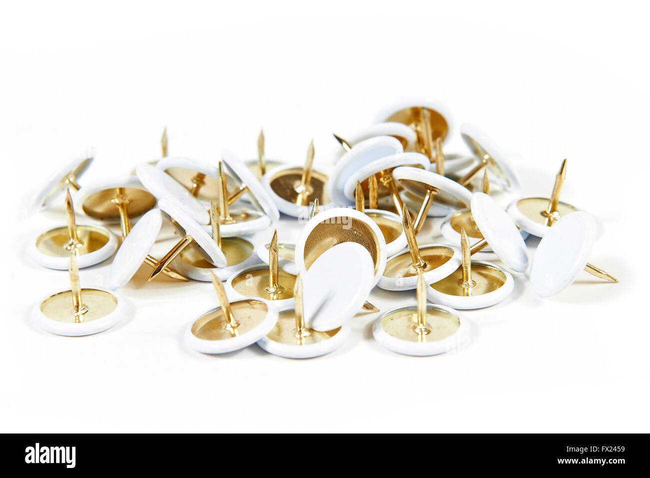 Closeup image of drawing pins on a white background Stock Photo - Alamy