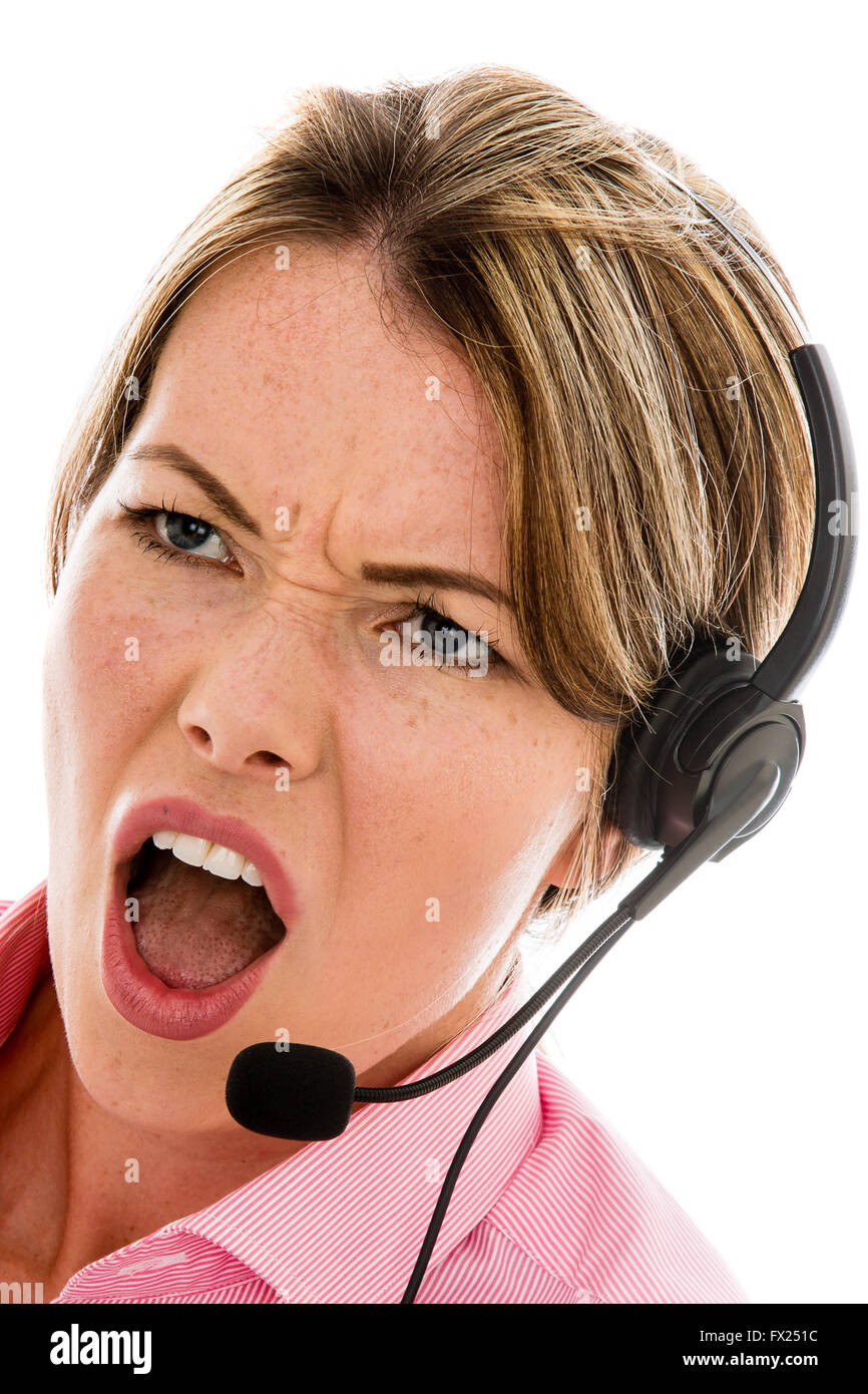 Frustrated Angry Customer Service Telesales Or Marketing Business Woman Talking Through A Headset, Isolated Against White Background Stock Photo