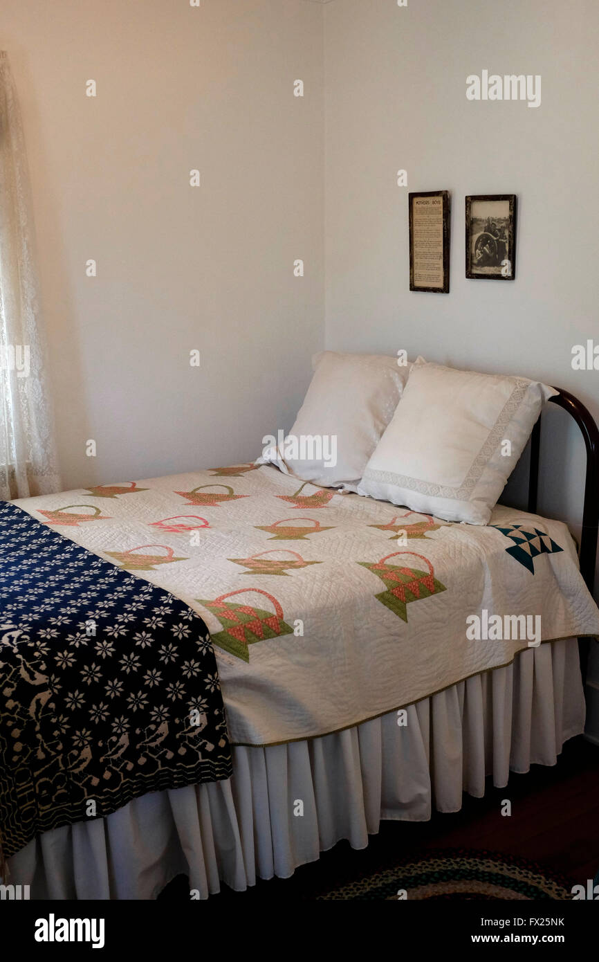 Bed on which Richard Nixon was born inside his childhood home in Nixon Birthplace and Museum, Yorba Linda, California Stock Photo