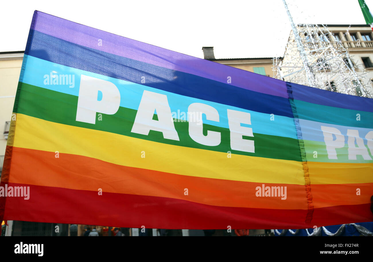 rainbow peace flag during a demonstration of peace activists in an Italian city Stock Photo