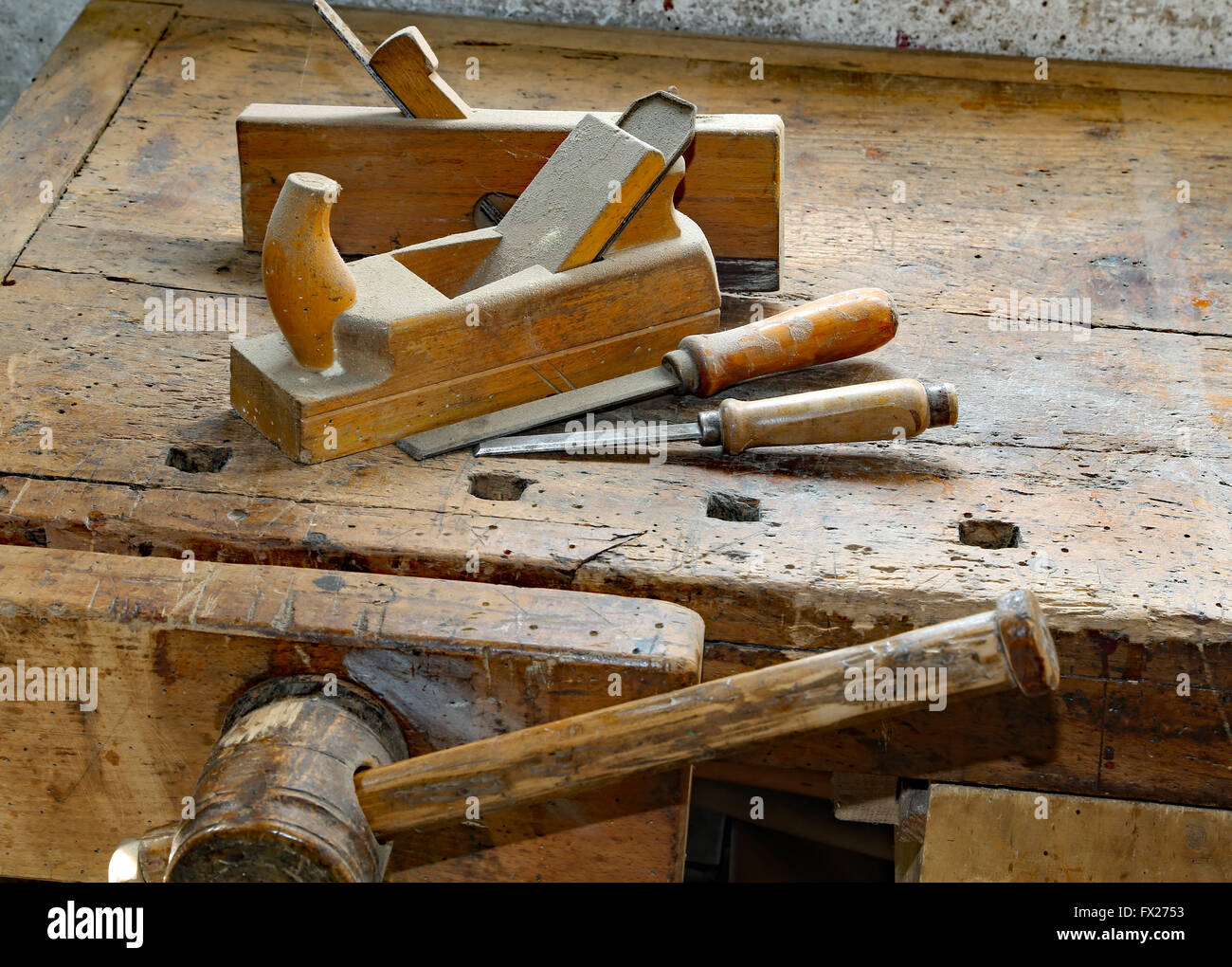 planes and chisels in the Workbench with a wooden grip inside the craftsman joinery manufacturer Stock Photo