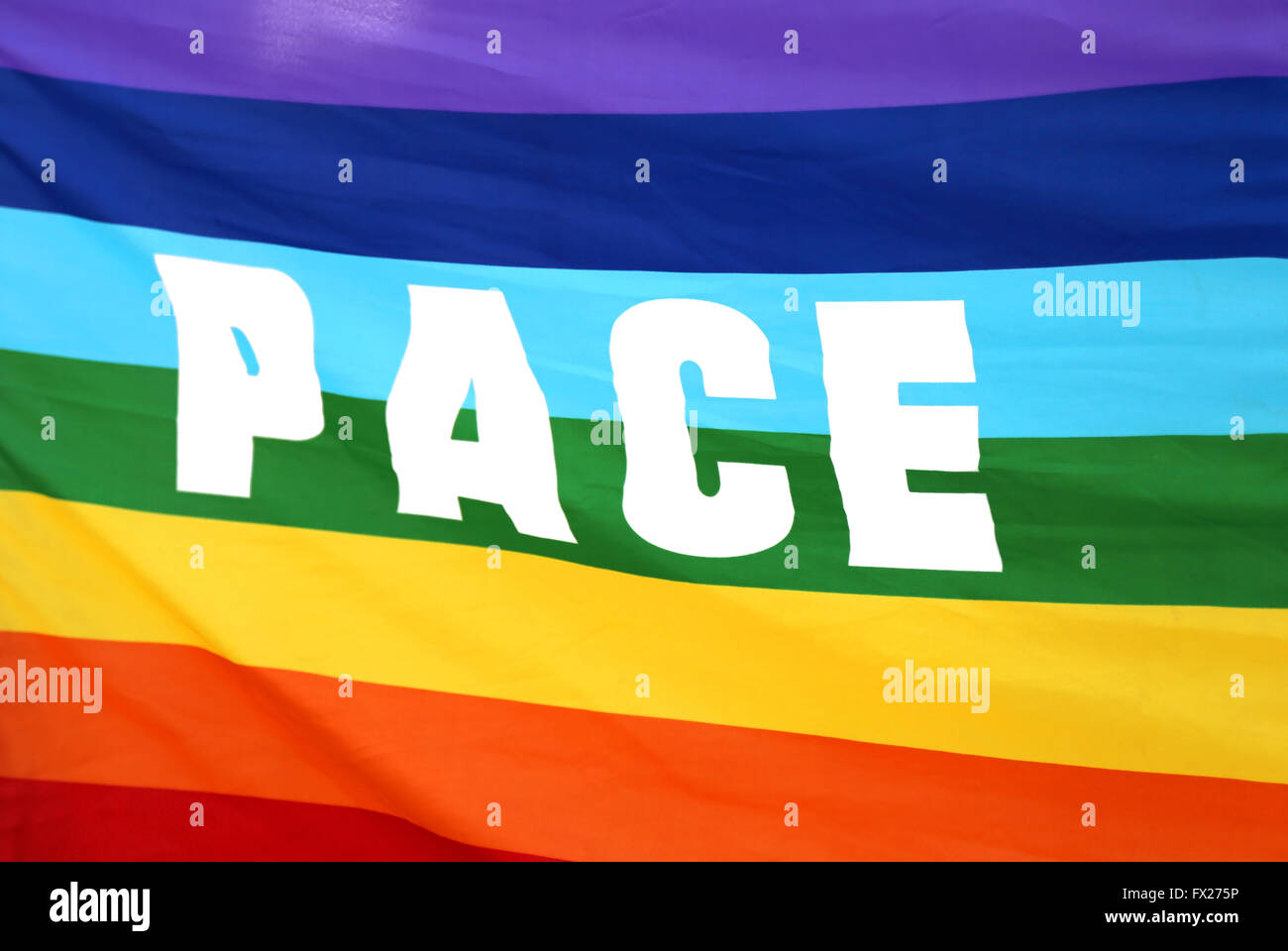 Italian rainbow Peace flag with big written PACE Stock Photo